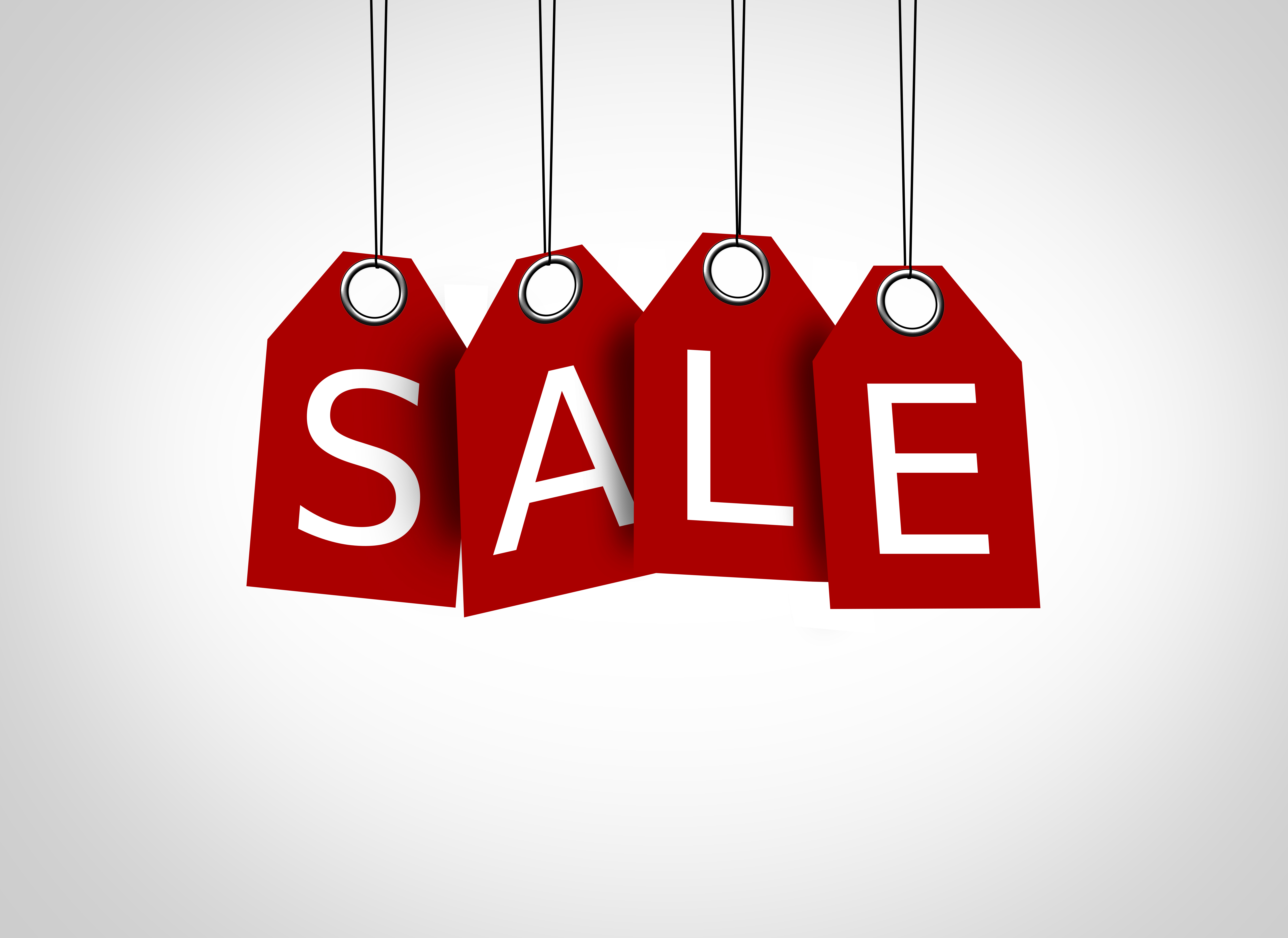 sale-red-tags-dangling-with-the-word-sale-sales-concept.jpg